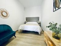 Postel nebo postele na pokoji v ubytování Apartamentos Turísticos Santo Rostro