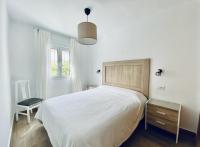 Postel nebo postele na pokoji v ubytování Apartamentos Turísticos Santo Rostro