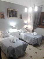 Posteľ alebo postele v izbe v ubytovaní Casa Particular
