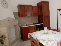 A kitchen or kitchenette at B&B Lo Scrigno del Salento