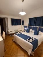 Posteľ alebo postele v izbe v ubytovaní Albis Rooms Guest House