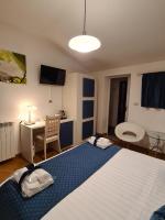 Posteľ alebo postele v izbe v ubytovaní Albis Rooms Guest House