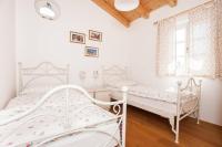 Postel nebo postele na pokoji v ubytování Villa Petra