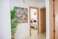 Posteľ alebo postele v izbe v ubytovaní Moott Homes Suites Villa Costacabana