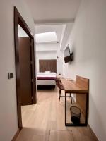 TV a/nebo společenská místnost v ubytování Evenia Alcalá Boutique Hotel