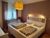 Posteľ alebo postele v izbe v ubytovaní Apartment by the Beach Nona