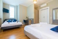 Łóżko lub łóżka w pokoju w obiekcie Martini Suite