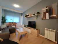 LG DownTown Sabadell Apartmentにあるテレビまたはエンターテインメントセンター