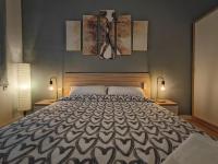 LG DownTown Sabadell Apartmentにあるベッド