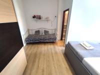 Posteľ alebo postele v izbe v ubytovaní Apartmani Sladić