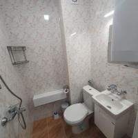 Koupelna v ubytování Apartment Voivoda