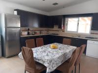Kuchyň nebo kuchyňský kout v ubytování Sunset Villa