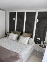 Posteľ alebo postele v izbe v ubytovaní Apartamento Casa Carmen Teguisol