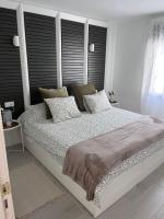 Posteľ alebo postele v izbe v ubytovaní Apartamento Casa Carmen Teguisol