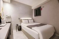 Hotel dongyangjang Dongdaemun-Jongnoにあるベッド