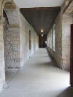 an empty hallway in an old stone building at O&#39;Couvent - Appartement 62 m2 - 2 chambres - A513 in Salins-les-Bains