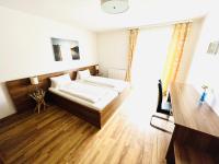 A bed or beds in a room at Haus Leitner