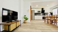 TV a/nebo společenská místnost v ubytování Suite Dream Capricho