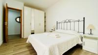 Postel nebo postele na pokoji v ubytování Suite Dream Capricho