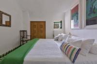 Posteľ alebo postele v izbe v ubytovaní Trulli Il Cappero by Perle di Puglia