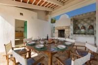Posedenie v ubytovaní Trulli Il Cappero by Perle di Puglia