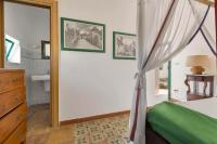 Posteľ alebo postele v izbe v ubytovaní Trulli Il Cappero by Perle di Puglia