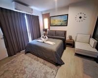 Postel nebo postele na pokoji v ubytování La Casita HuaHin by Tasing