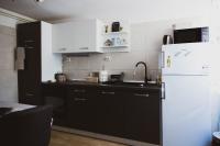 Kuchyň nebo kuchyňský kout v ubytování Soba i Apartman Đula