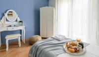 Posteľ alebo postele v izbe v ubytovaní Olive tree Apartment