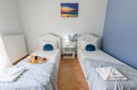 Posteľ alebo postele v izbe v ubytovaní Olive tree Apartment