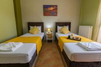 Posteľ alebo postele v izbe v ubytovaní Olive tree Apartment