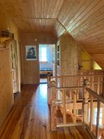 Televízia a/alebo spoločenská miestnosť v ubytovaní Gunia Gesthouse