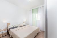 Postel nebo postele na pokoji v ubytování Kuća Lana