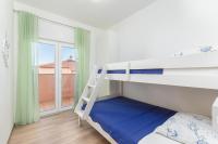 Postel nebo postele na pokoji v ubytování Kuća Lana