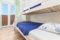 Postel nebo postele na pokoji v ubytování Kuća Lana