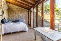 Postel nebo postele na pokoji v ubytování Townhouse La Fresqueta by homevillas360