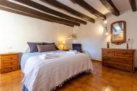 Postel nebo postele na pokoji v ubytování Townhouse La Fresqueta by homevillas360