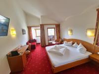 Posteľ alebo postele v izbe v ubytovaní Das Alpin - Hotel Garni Guesthouse