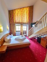 Posteľ alebo postele v izbe v ubytovaní Das Alpin - Hotel Garni Guesthouse
