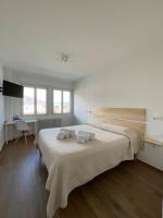 Posteľ alebo postele v izbe v ubytovaní Settimo Cielo Apartment Aosta CIR 0199