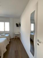 Posteľ alebo postele v izbe v ubytovaní Settimo Cielo Apartment Aosta CIR 0199