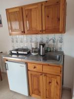 Kuchyňa alebo kuchynka v ubytovaní Marianna Apartments