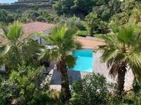 Bazén v ubytovaní Appartement - Maison "Le pied à terre 1" PORTICCIO alebo v jeho blízkosti