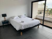 Posteľ alebo postele v izbe v ubytovaní Appartement - Maison "Le pied à terre 1" PORTICCIO