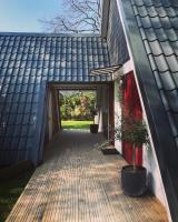 Vonkajšia záhrada v ubytovaní Chalet en Normandie au coeur du pays d'Auge
