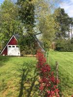 Vonkajšia záhrada v ubytovaní Chalet en Normandie au coeur du pays d'Auge