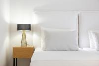 Posteľ alebo postele v izbe v ubytovaní Adria Luxury Apartments