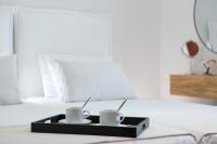 Posteľ alebo postele v izbe v ubytovaní Adria Luxury Apartments