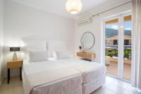 Posteľ alebo postele v izbe v ubytovaní Adria Luxury Apartments