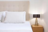 Posteľ alebo postele v izbe v ubytovaní Adria Luxury Apartments